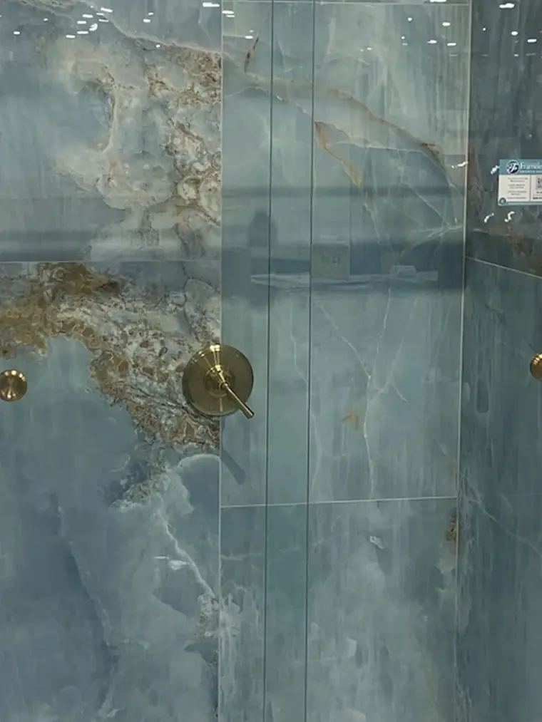 Blue marble-look large format shower tile