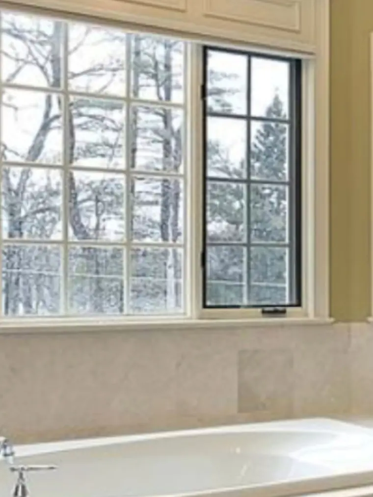 Large divided-light replacement window in a bathroom