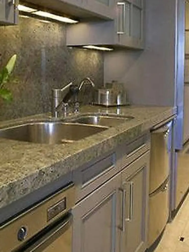 Granite counter with a double stainless sink