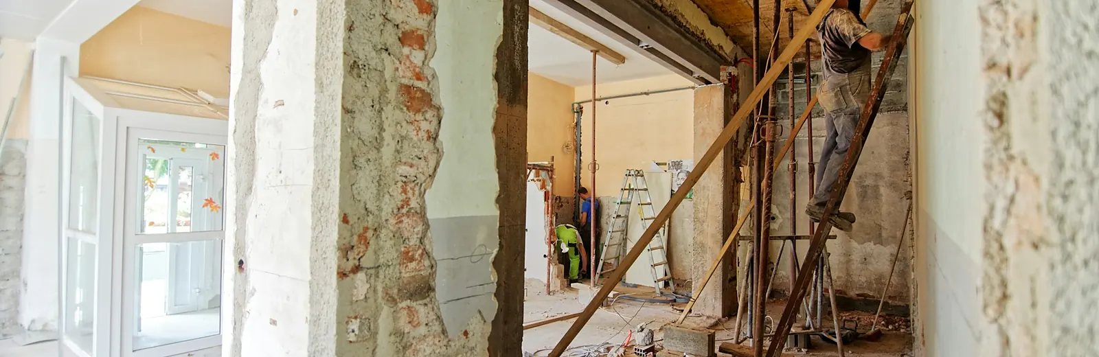 Home interior being dried and repaired after water damage